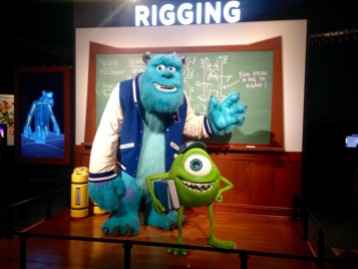 Mike and Sully greet visitors as they enter the exhibit and welcome them to the Rigging Department.