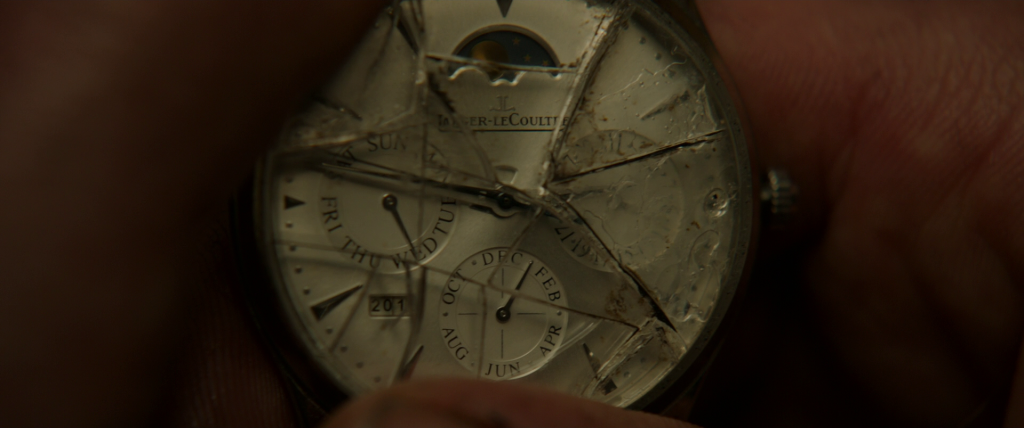 Strange's broken watch face after being mugged outside of Kamar-Taj. The year is obscured, but the month indicated is January.